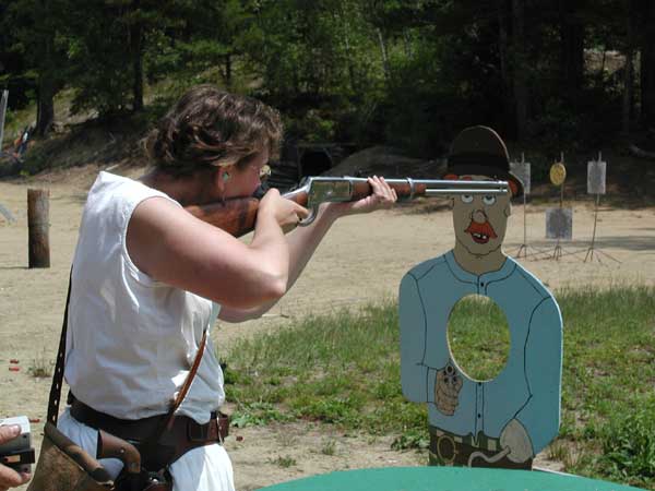Tag-Along-Tess shooting rifle.