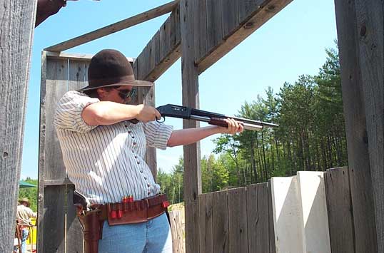 Shooting her Winchester '97 pump shotgun ...